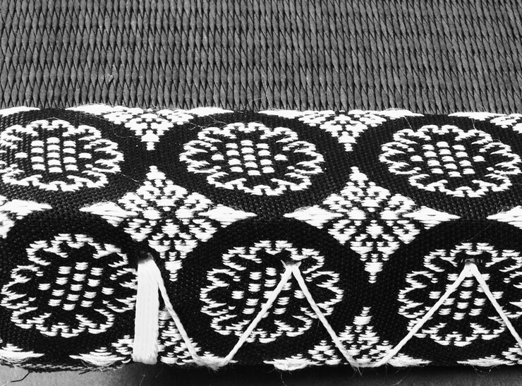 Detailansicht einer chinesischen Tatami-Matte – Standardausführung mit dekorativem Randmuster